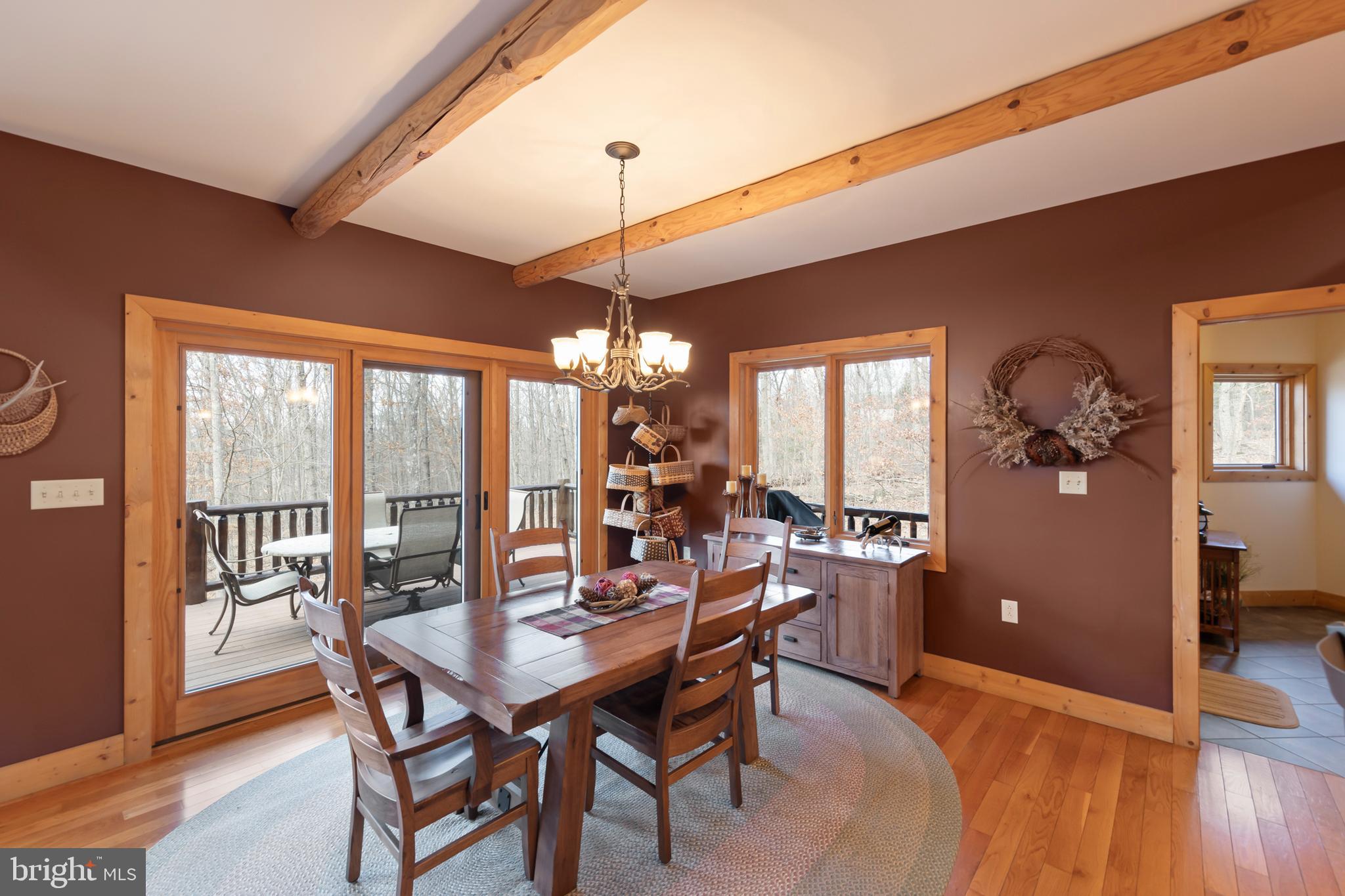 181 Signal Ridge Lane Winchester, VA 22603 - Photo 5 of 70 a view of a dining room with furniture window and wooden floor