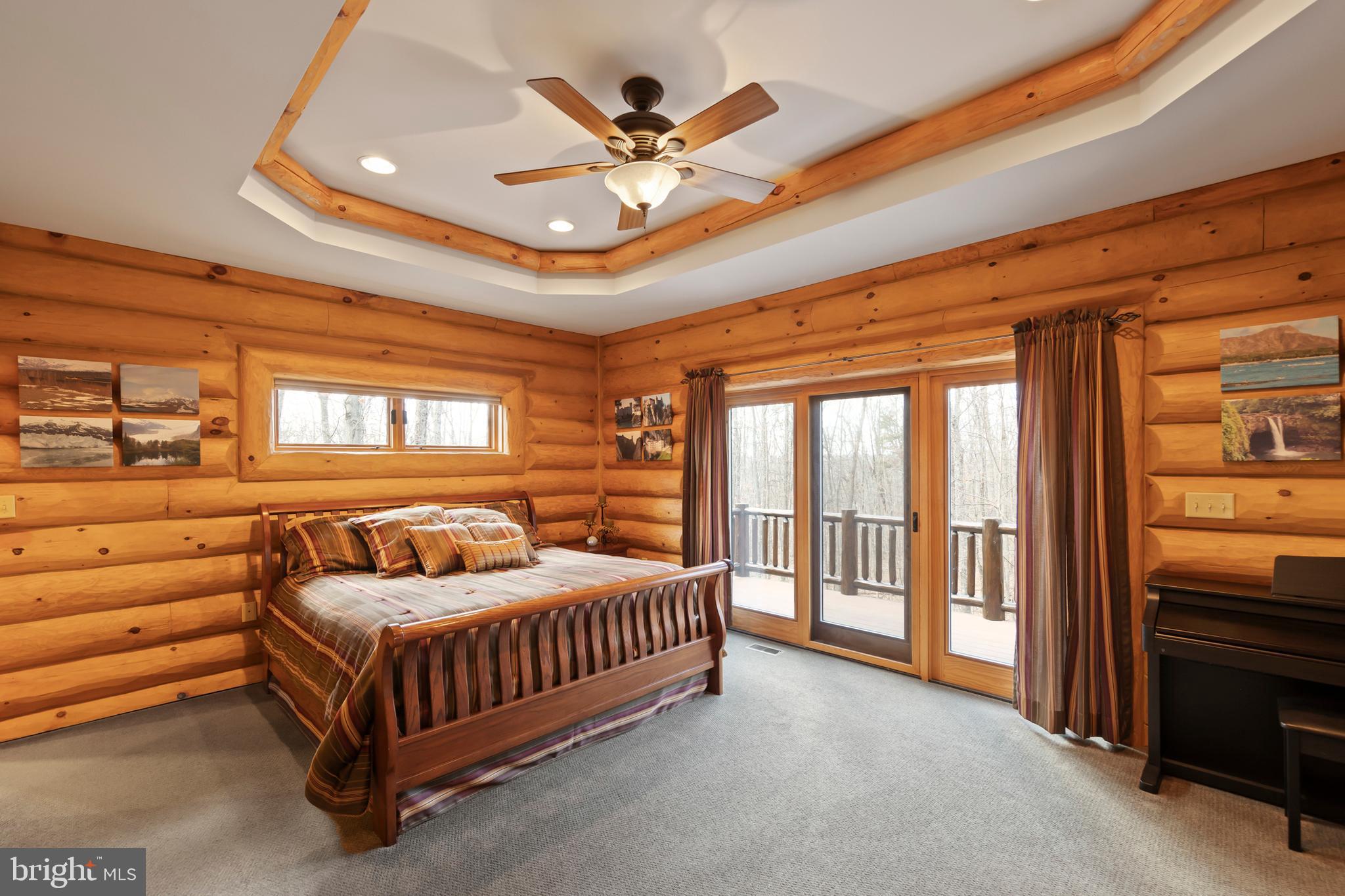 181 Signal Ridge Lane Winchester, VA 22603 - Photo 6 of 70 a bedroom with a bed and a ceiling fan