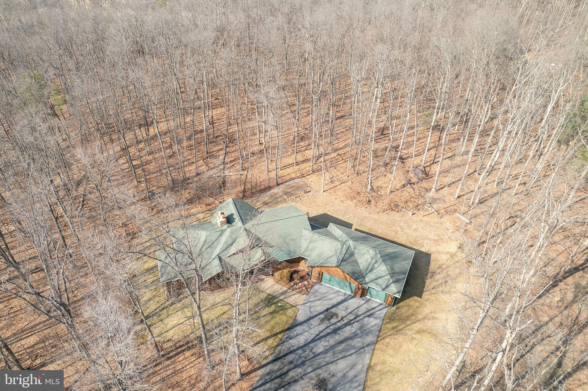 181 Signal Ridge Lane Winchester, VA 22603 - Photo 62 of 70 a bed sitting in a bedroom next to a wall