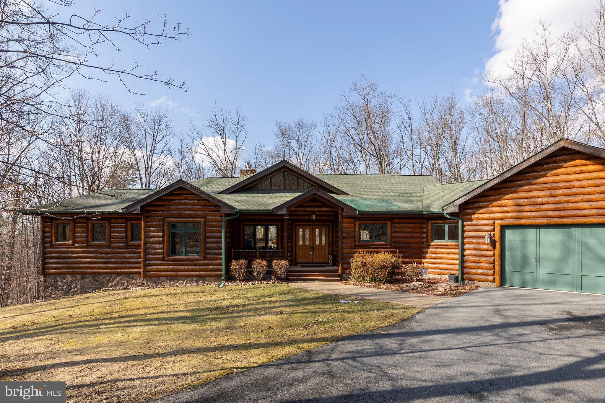181 Signal Ridge Lane Winchester, VA 22603 - Photo 65 of 70 a front view of a house with garden