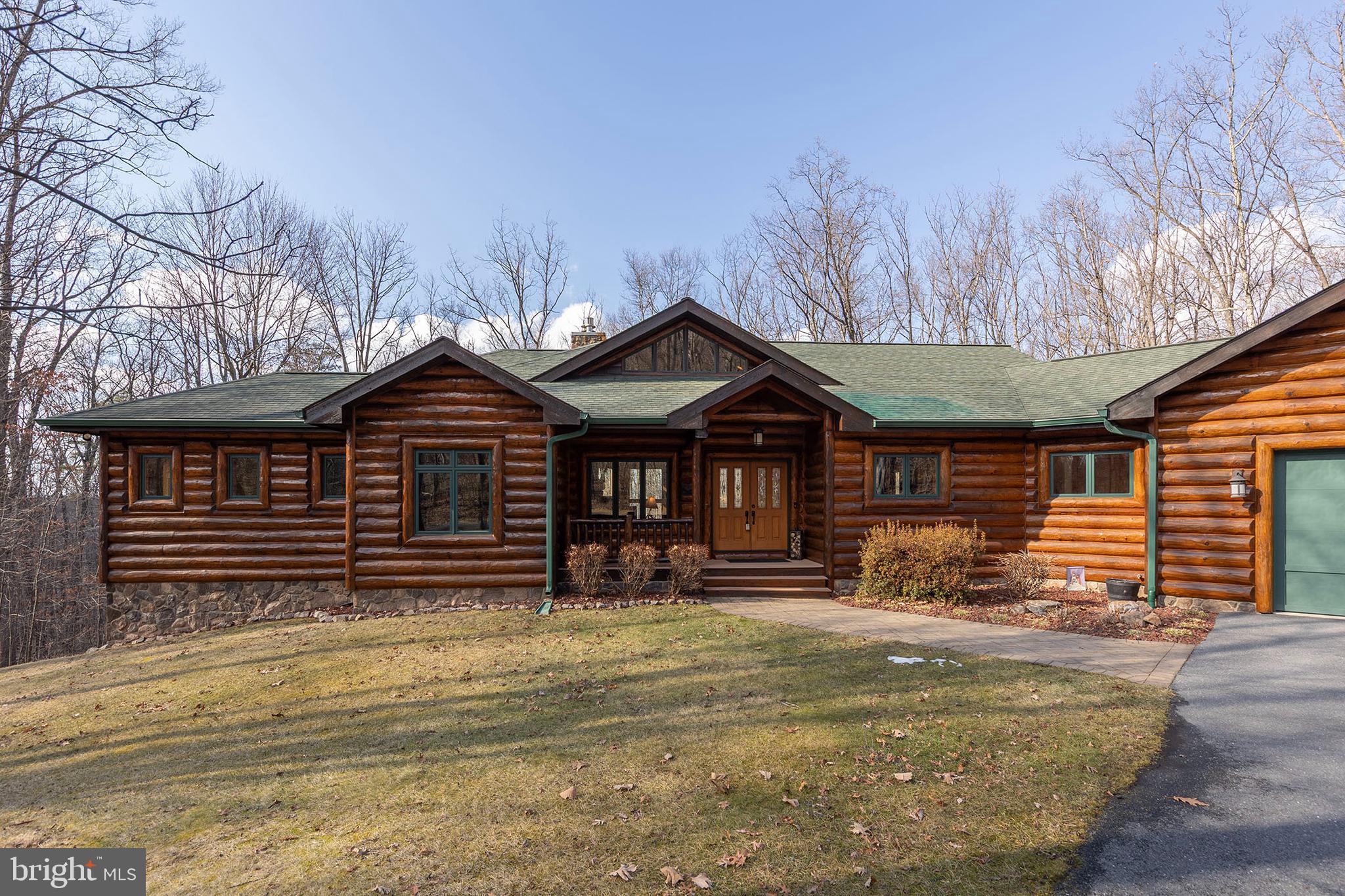 181 Signal Ridge Lane Winchester, VA 22603 - Photo 67 of 70 a front view of a house with a yard