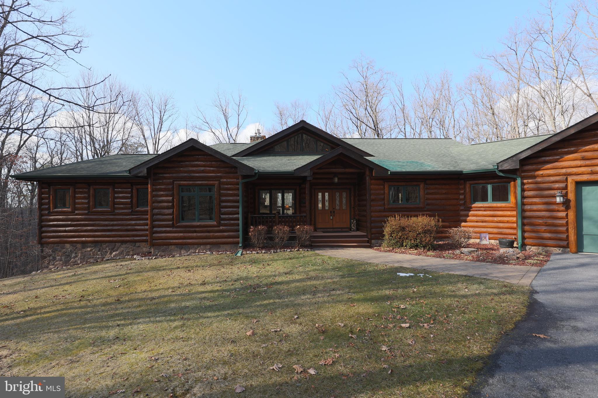 181 Signal Ridge Lane Winchester, VA 22603 - Photo 68 of 70 a front view of a house with a yard