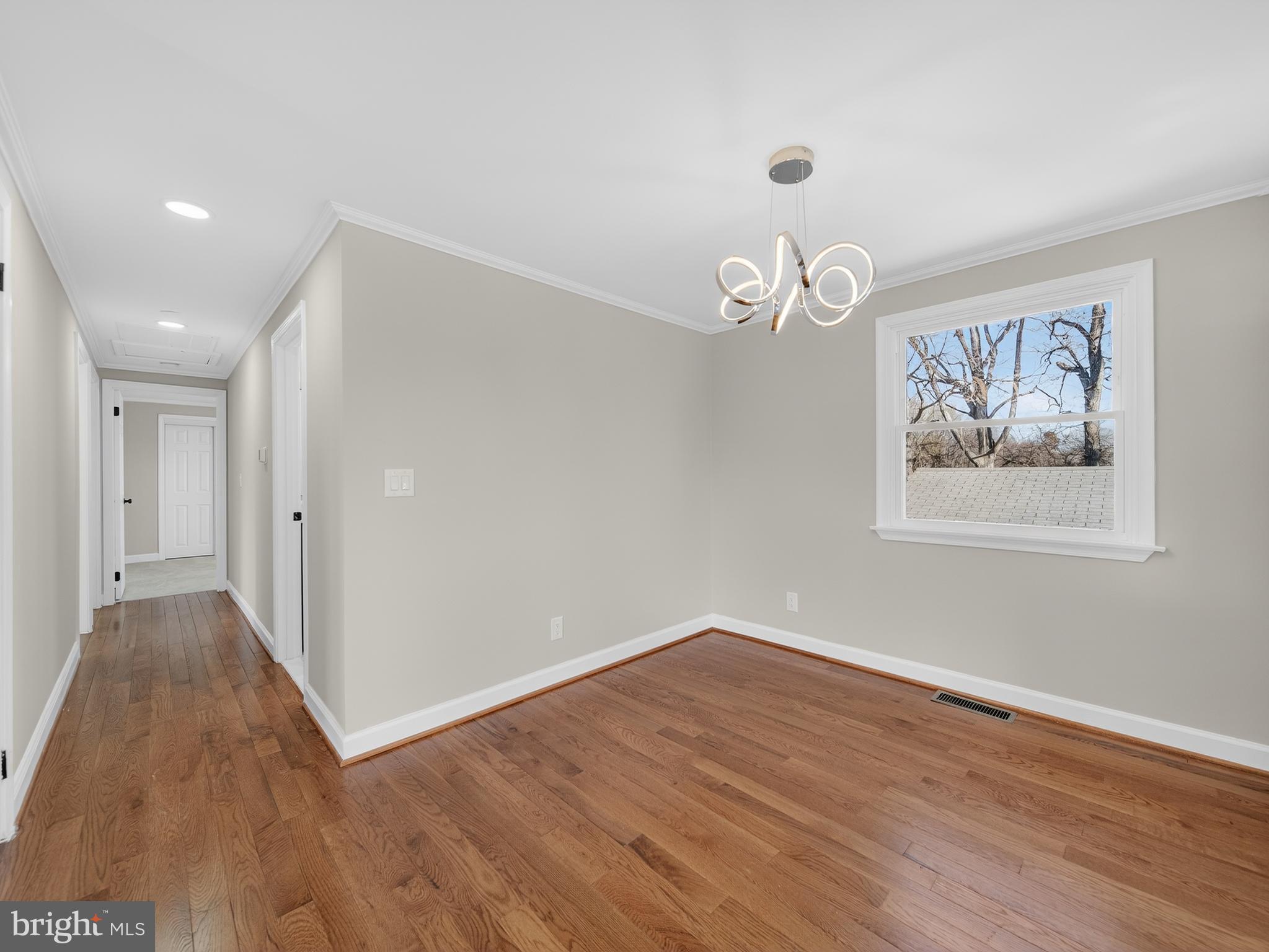 24676 Old 3 Notch Road Hollywood, MD 20636 - Photo 12 of 45 a view of a room with wooden floor and window