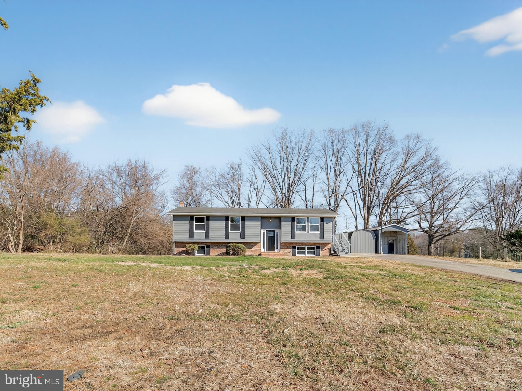24676 Old 3 Notch Road Hollywood, MD 20636 - Photo 2 of 45 a view of a house with a yard