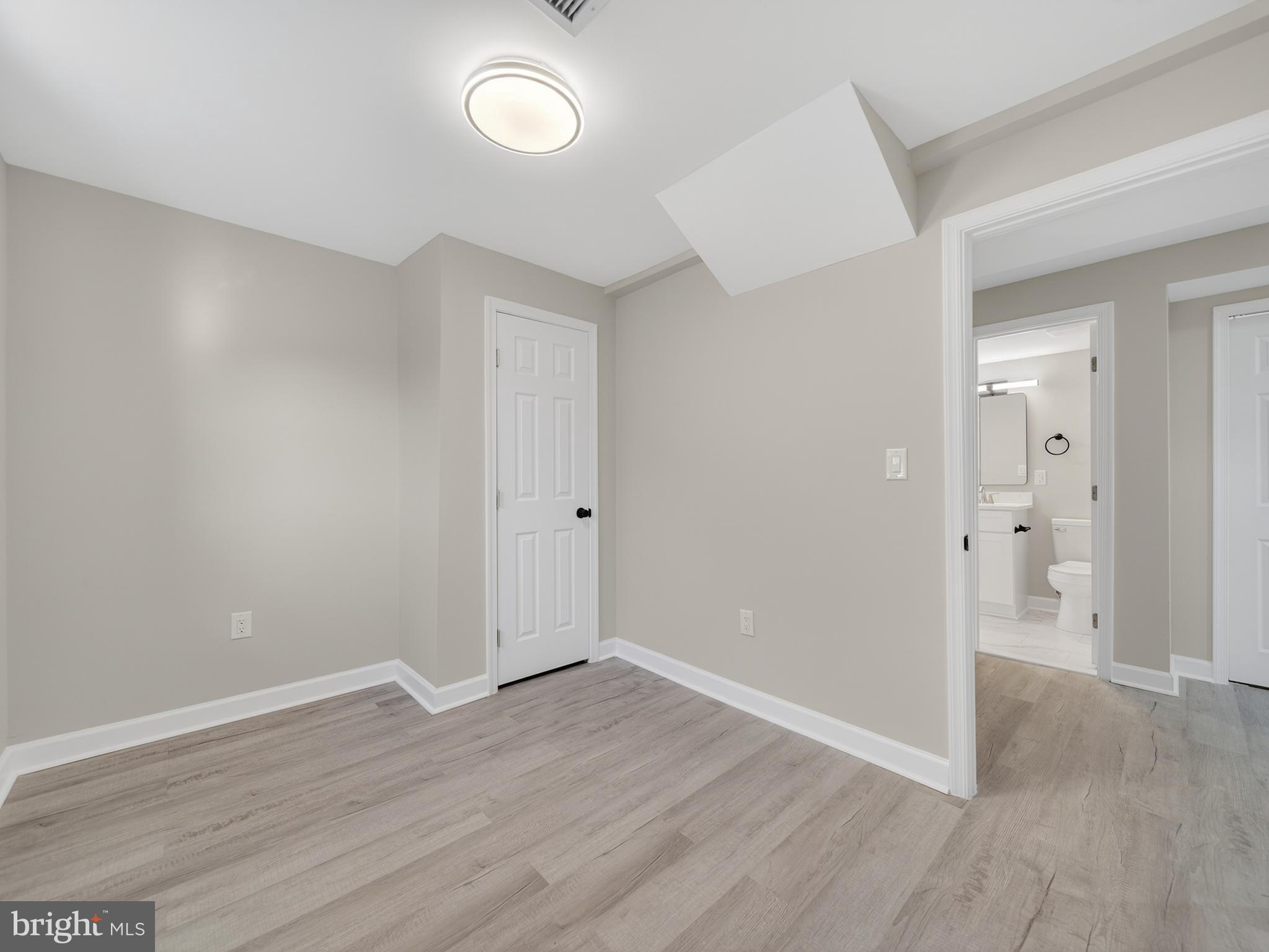 24676 Old 3 Notch Road Hollywood, MD 20636 - Photo 30 of 45 wooden floor in an empty room