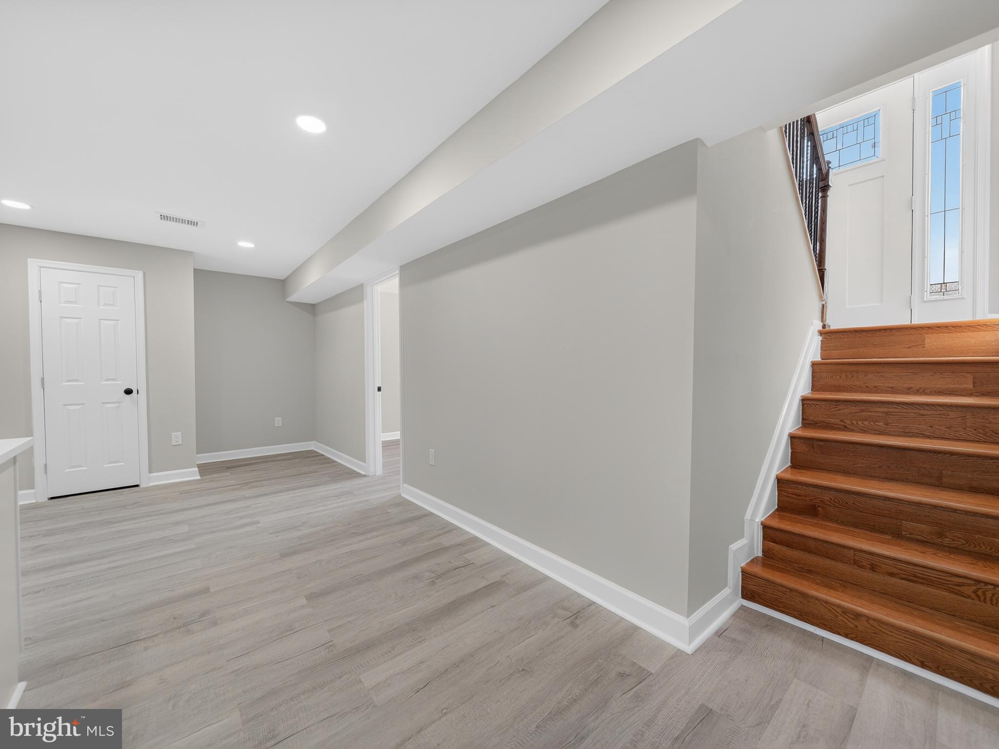 24676 Old 3 Notch Road Hollywood, MD 20636 - Photo 36 of 45 wooden floor in an empty room with stairs