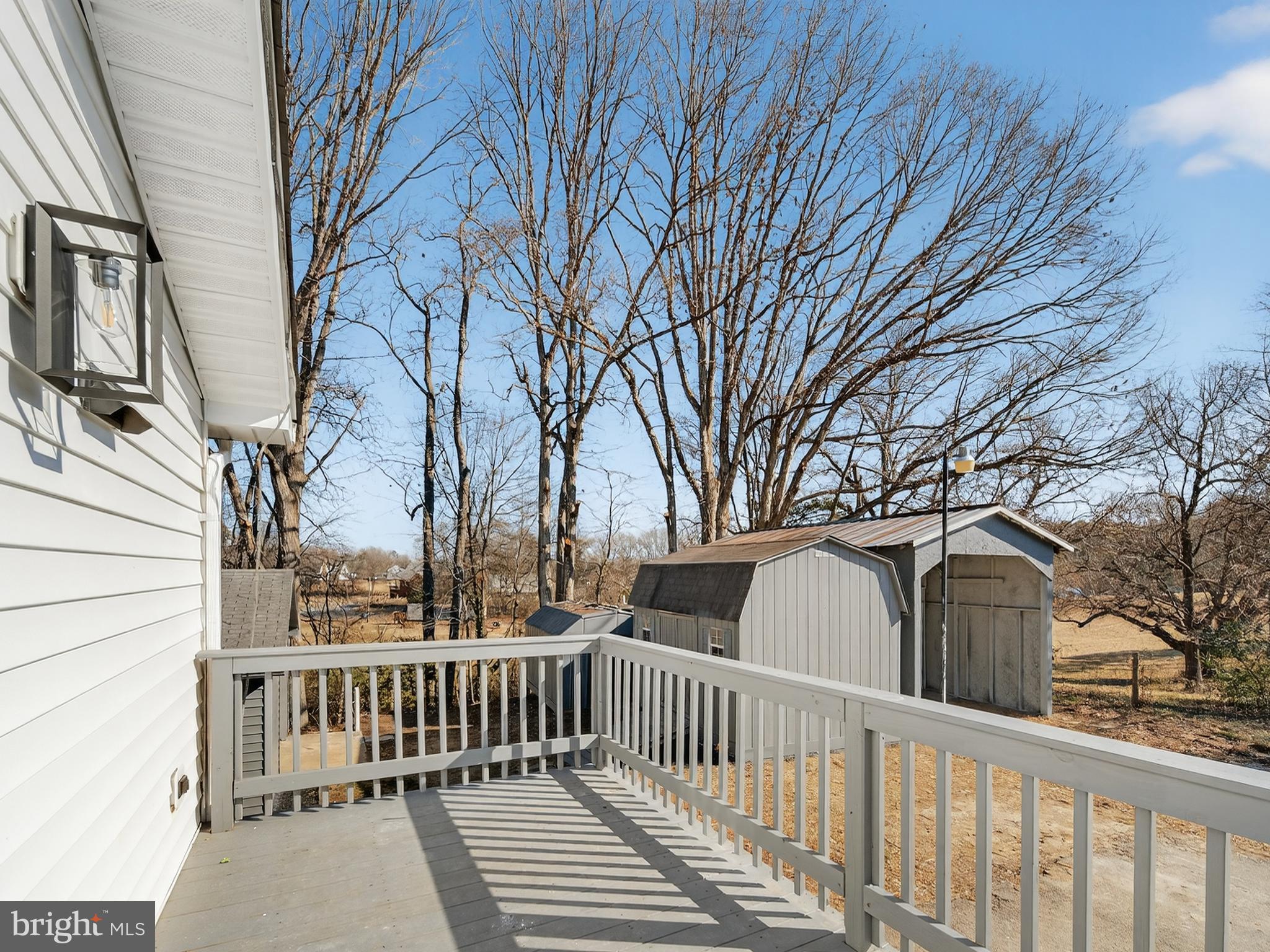 24676 Old 3 Notch Road Hollywood, MD 20636 - Photo 45 of 45 a view of a wooden house with a large tree