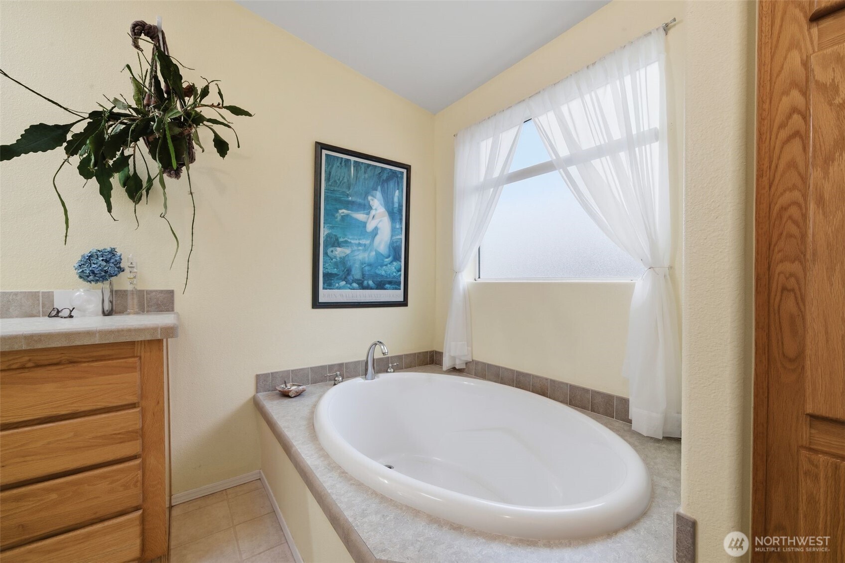 1913 7th Street Sedro-Woolley, WA 98284 - Photo 15 of 28 a bathroom with a bathtub and a sink