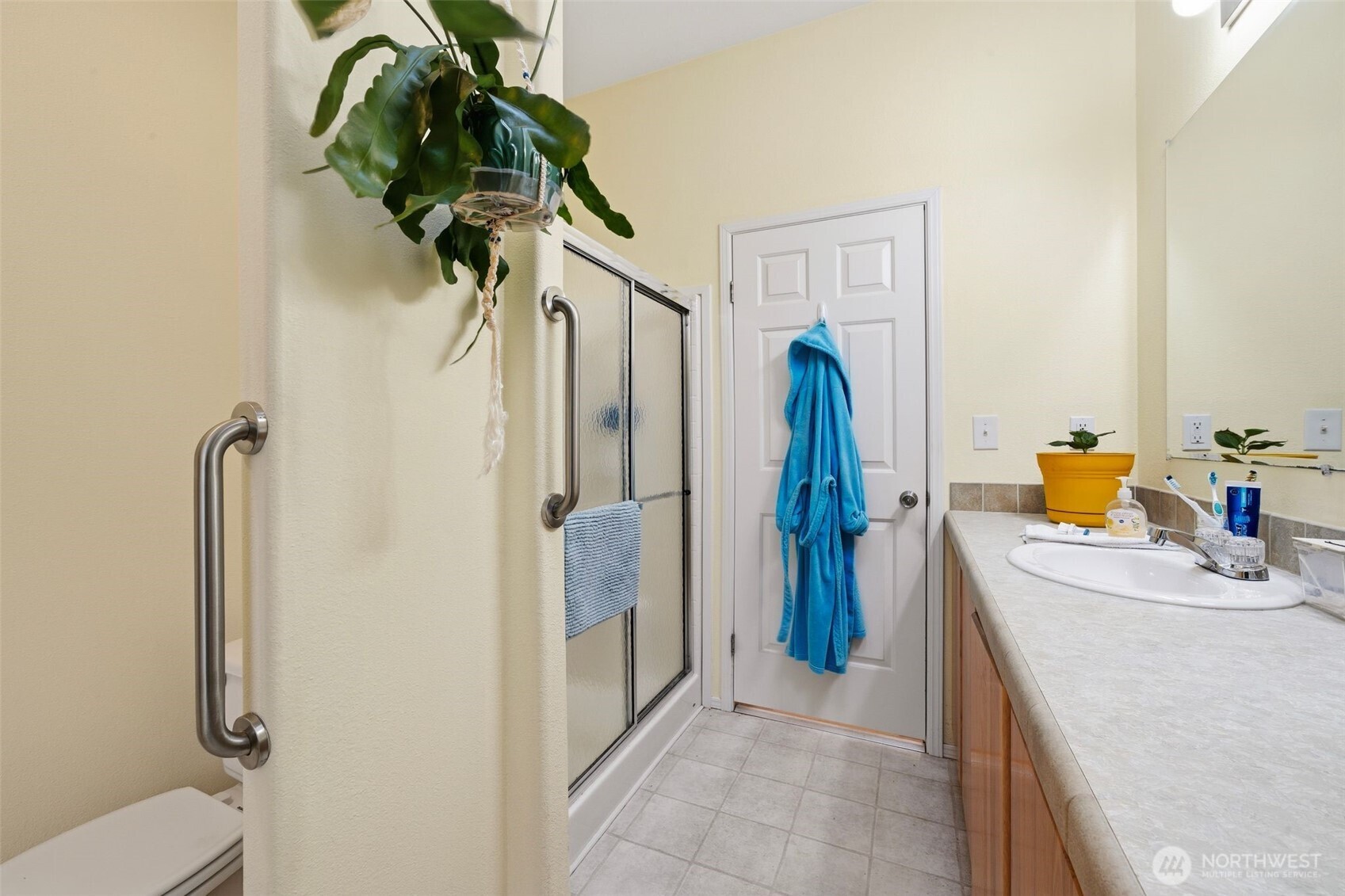 1913 7th Street Sedro-Woolley, WA 98284 - Photo 16 of 28 a bathroom with a sink a toilet and shower