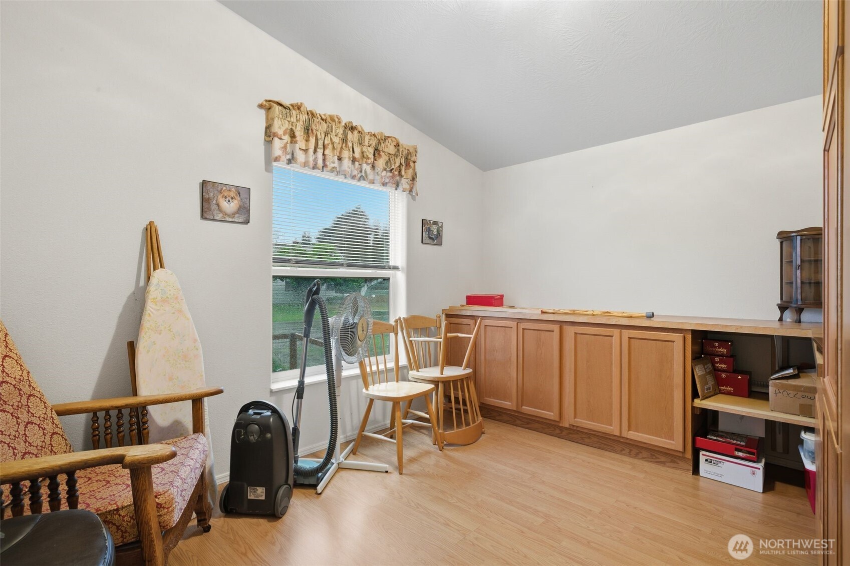 1913 7th Street Sedro-Woolley, WA 98284 - Photo 17 of 28 a view of a workspace with furniture and a bedroom