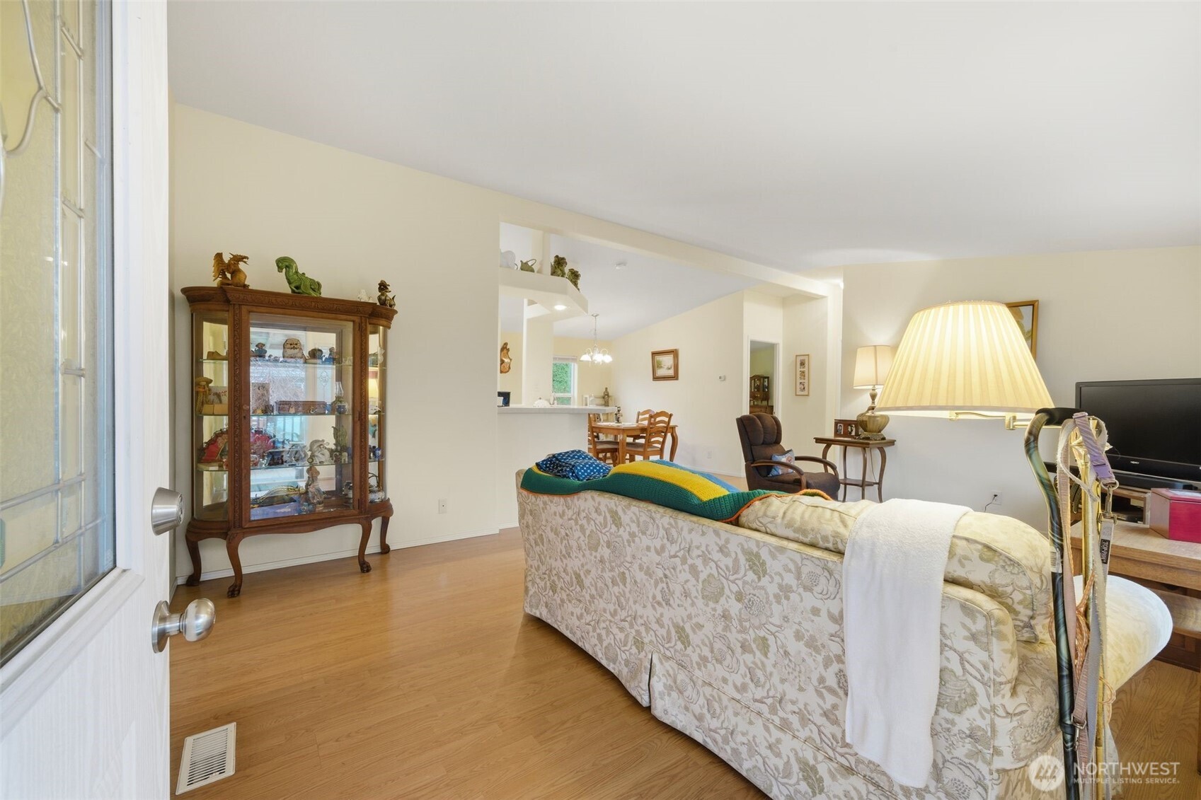 1913 7th Street Sedro-Woolley, WA 98284 - Photo 3 of 28 a living room with furniture and a lamp
