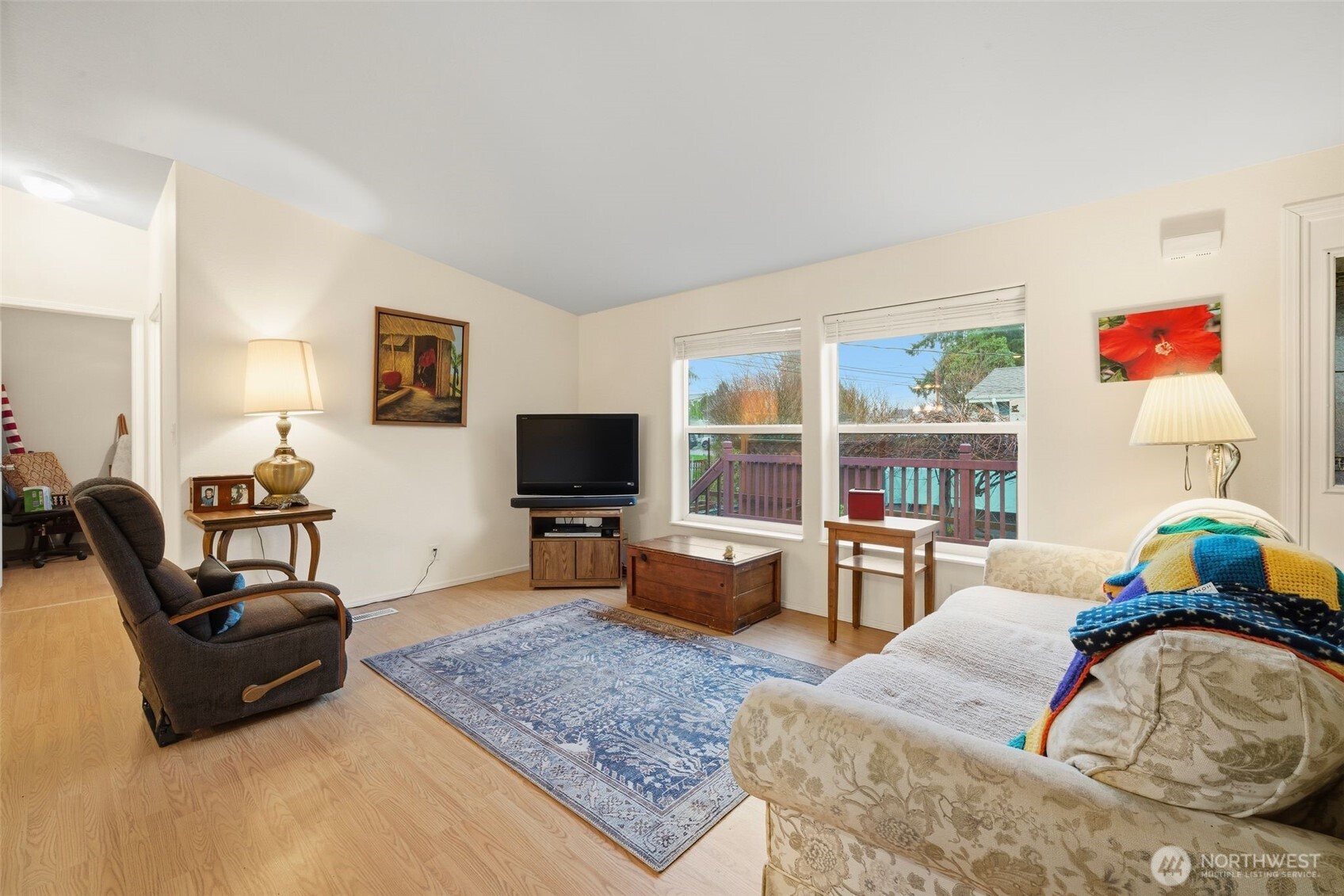 1913 7th Street Sedro-Woolley, WA 98284 - Photo 4 of 28 a bedroom with furniture and a flat screen tv