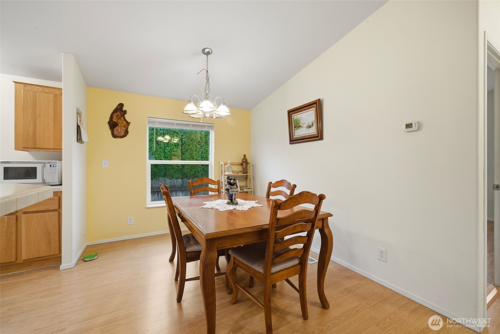 1913 7th Street Sedro-Woolley, WA 98284 - Photo 6 of 28 a view of a dining room with furniture window and wooden floor