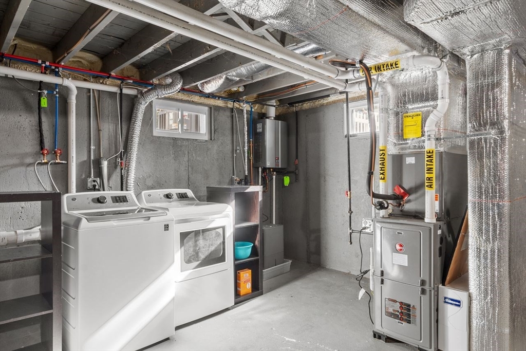 51 Valley Road Tewksbury, MA 01876 - Photo 14 of 17 a utility room with dryer and washer
