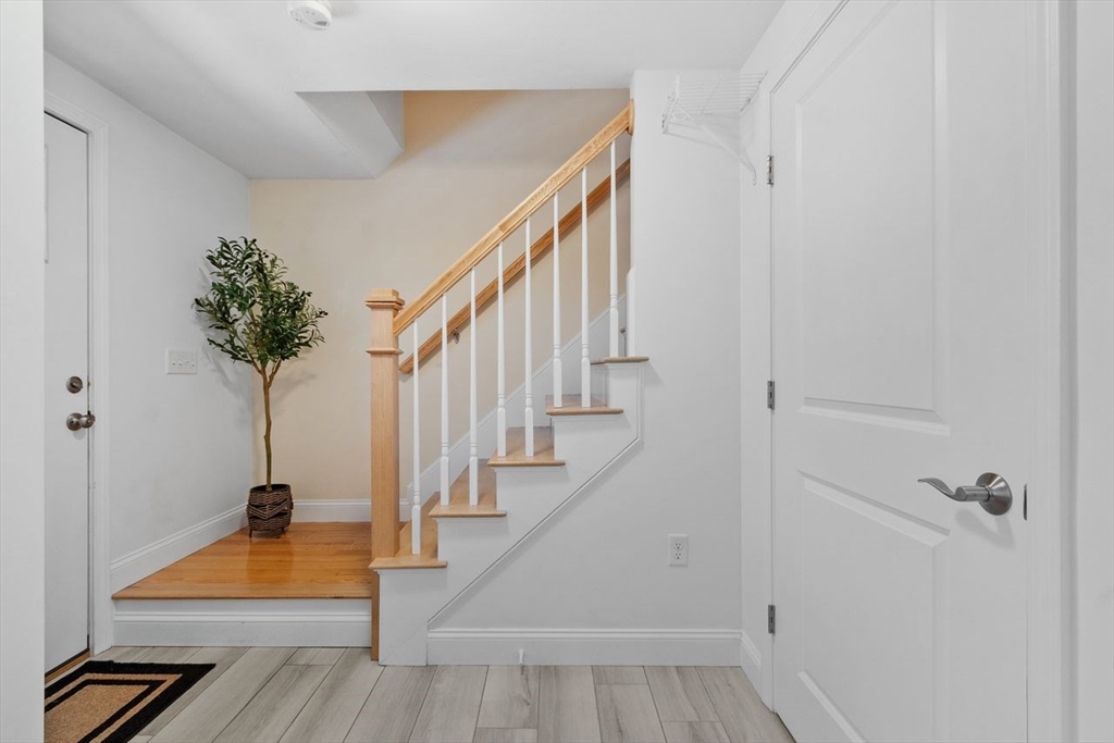 51 Valley Road Tewksbury, MA 01876 - Photo 4 of 17 a view of entryway with wooden floor
