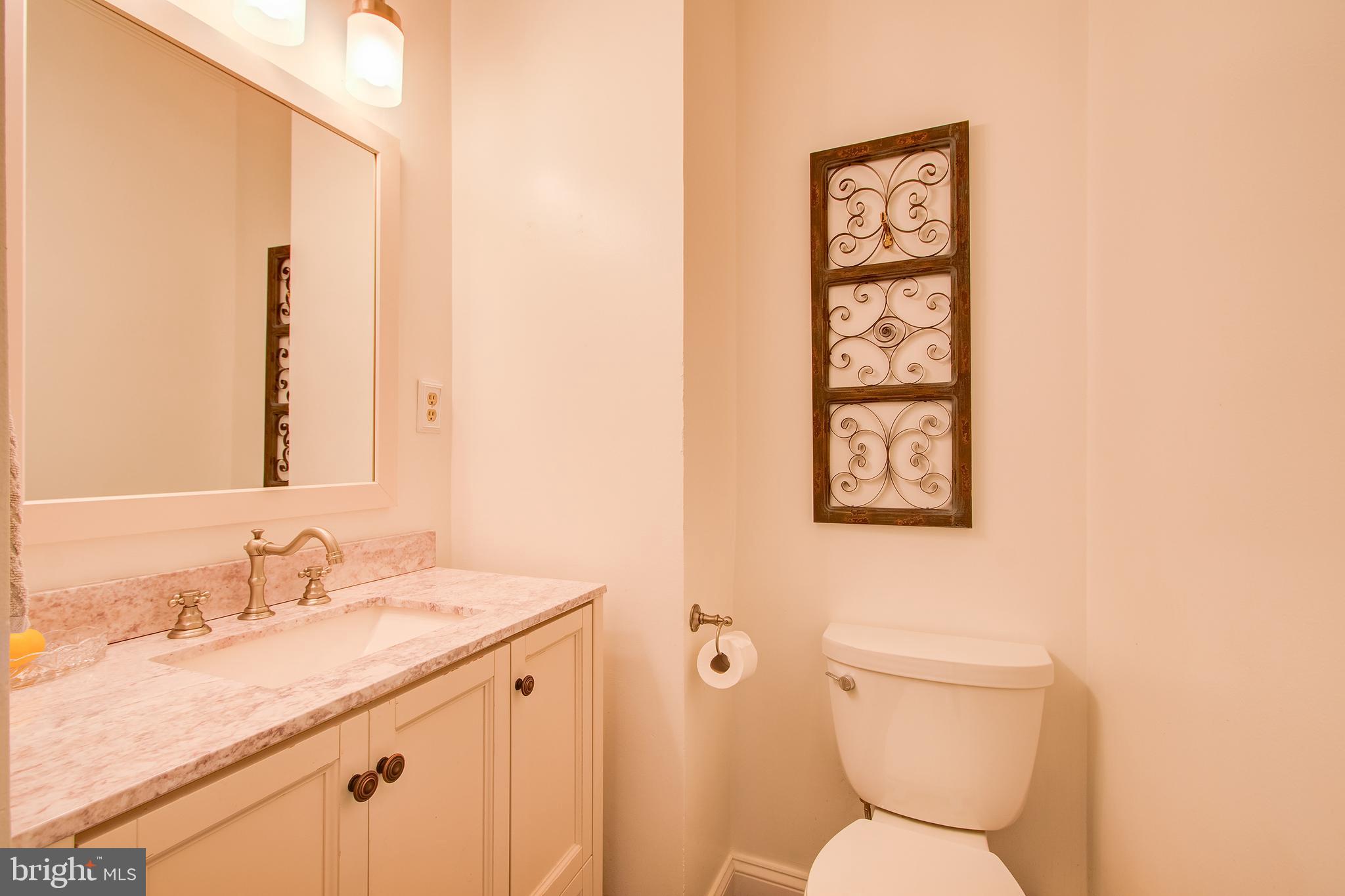 14718 Claude Lane Silver Spring, MD 20905 - Photo 17 of 39 main floor powder room