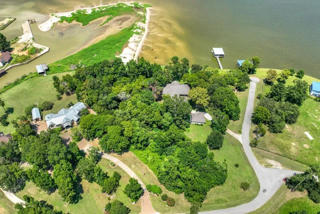 view of a house with a yard and outdoor seating