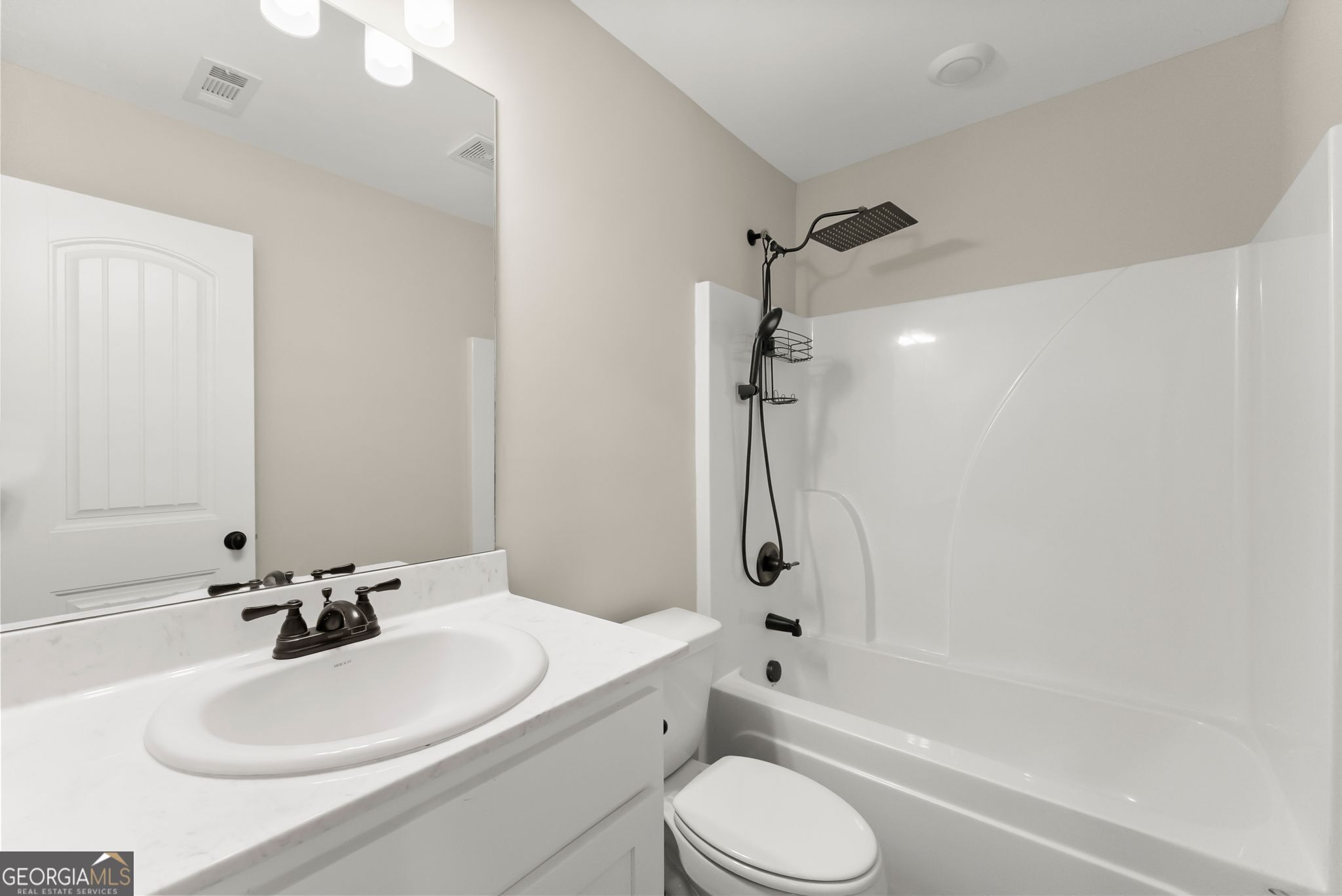 810 Anderson Thomas Road Martin, GA 30557 - Photo 20 of 40 a bathroom with a sink toilet and shower