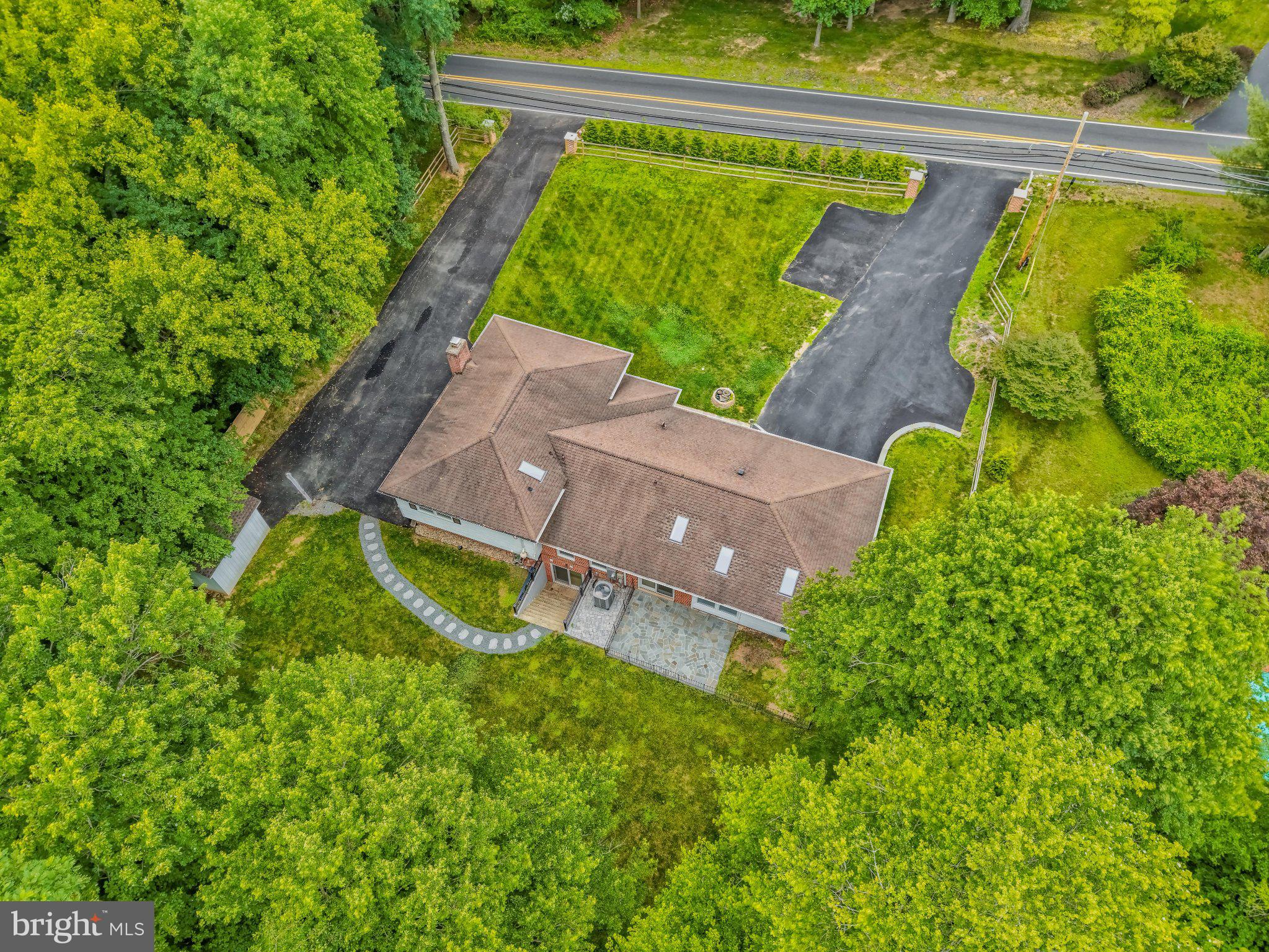 3219 Fox Mill Road Oakton, VA 22124 - Photo 82 of 87 Serene home nestled in lush greenery.