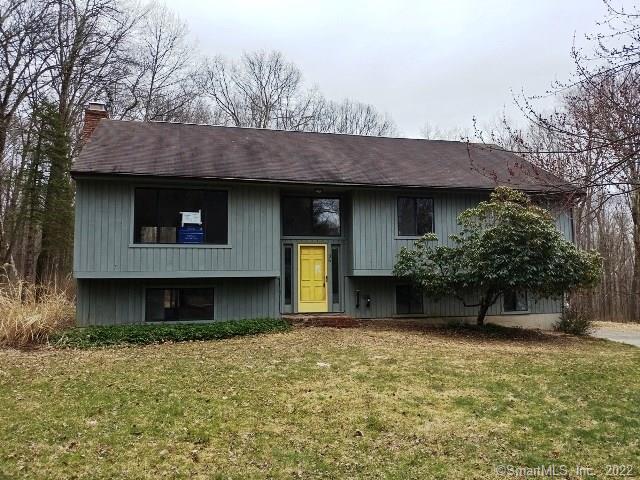 35 Revere Road Washington, CT 06793 - Photo 1 of 1 a front view of a house with garden