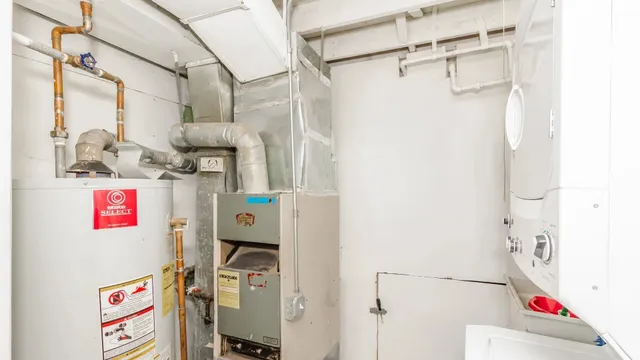 a backyard of a house with lots of green space and fountain