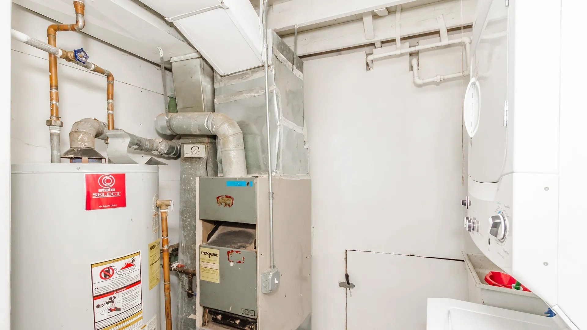 5141 South Carpenter Street Chicago, IL 60609 - Photo 17 of 23 a utility room with fridge dryer and washer