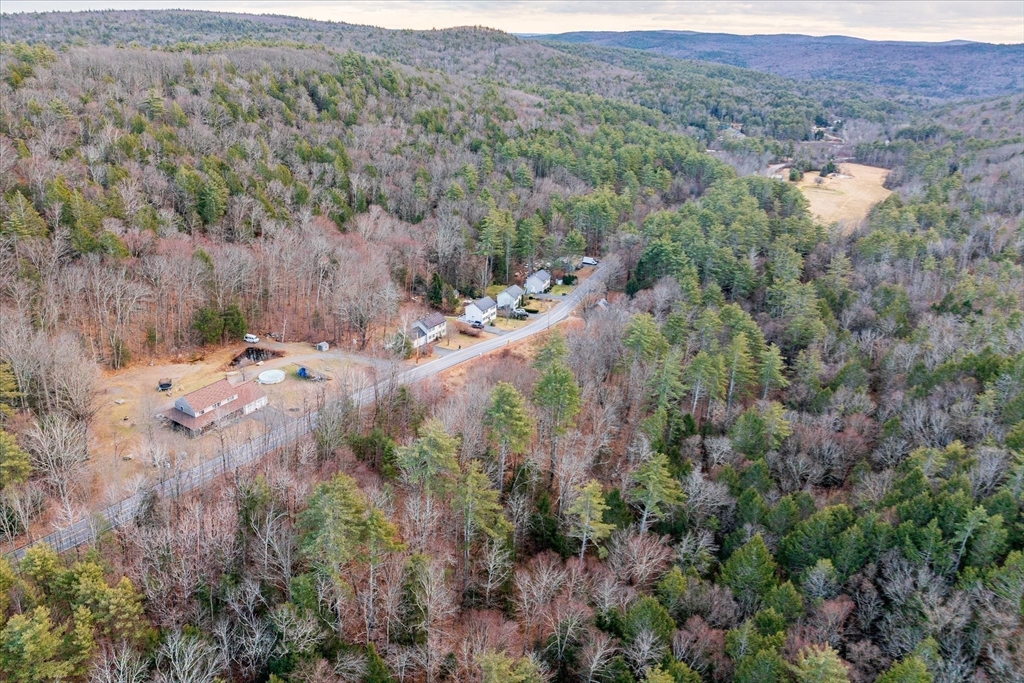 1-4 North Street Erving, MA 01344 - Photo 2 of 10 an aerial view of house with yard and mountain view