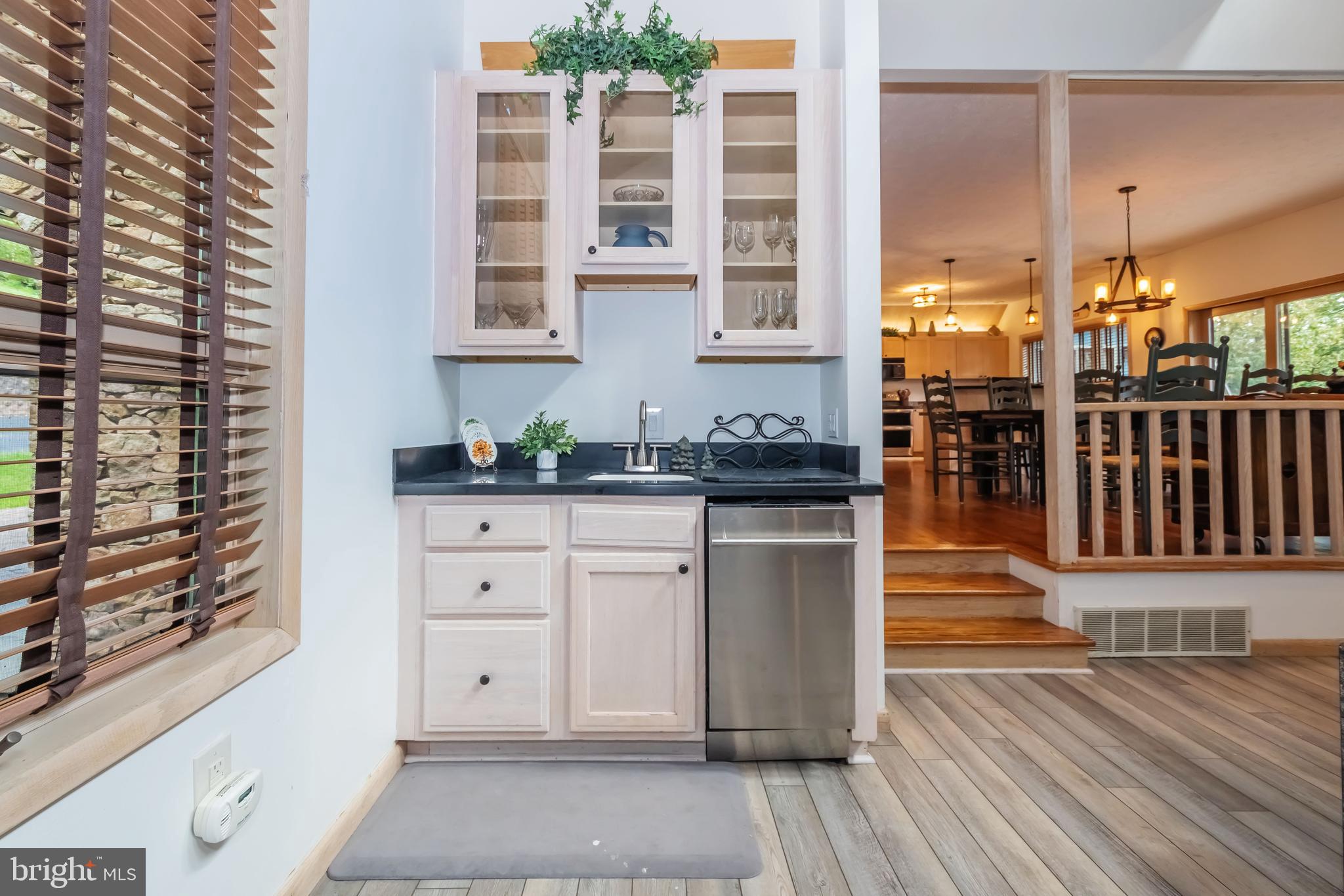 2345 Marsh Hill Road McHenry, MD 21541 - Photo 17 of 77 a view of a bathroom with a sink and glass door