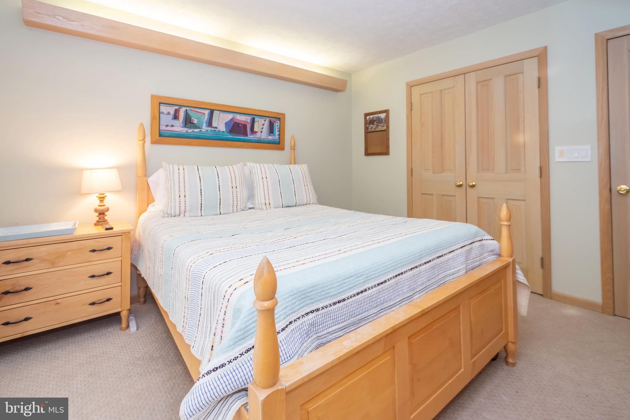 2345 Marsh Hill Road McHenry, MD 21541 - Photo 34 of 77 a bedroom with a bed and a cabinet