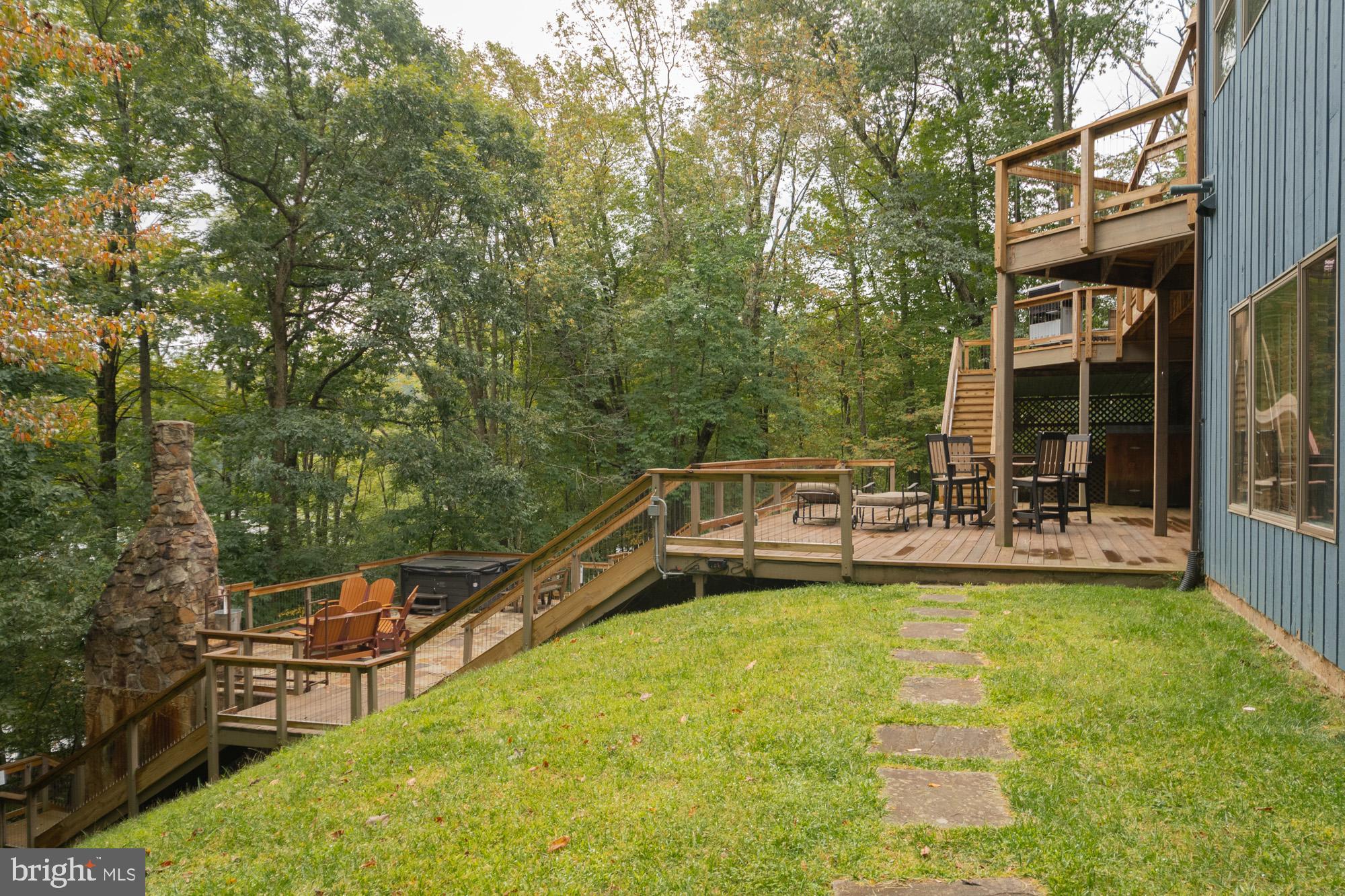 2345 Marsh Hill Road McHenry, MD 21541 - Photo 65 of 77 a view of a swimming pool with a patio