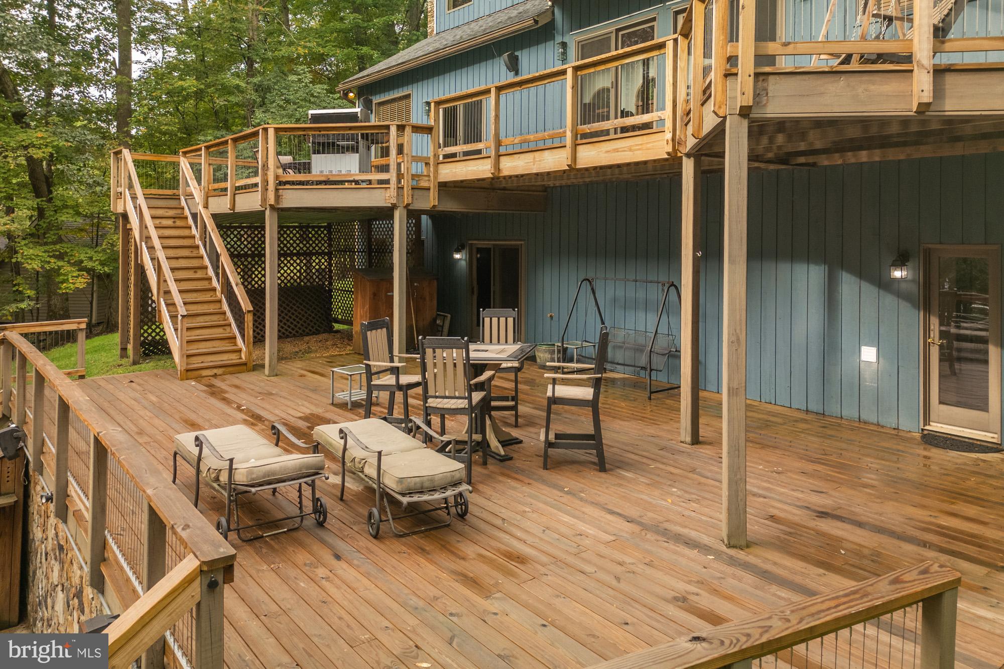 2345 Marsh Hill Road McHenry, MD 21541 - Photo 73 of 77 a view of a patio with couches table and chairs