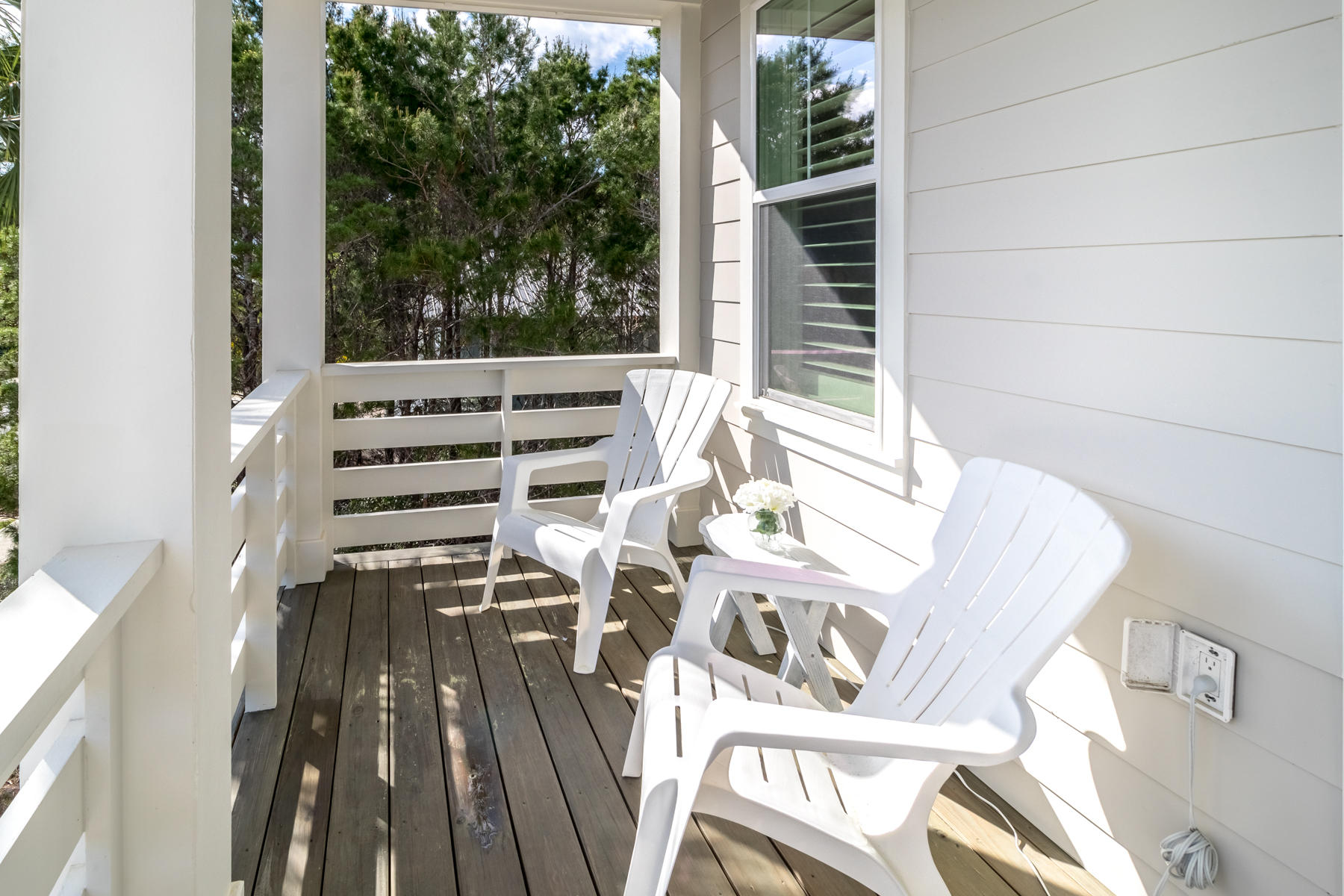 119 Michaela Lane Santa Rosa Beach, FL 32459 - Photo 14 of 28 a view of balcony with two chairs and a rug