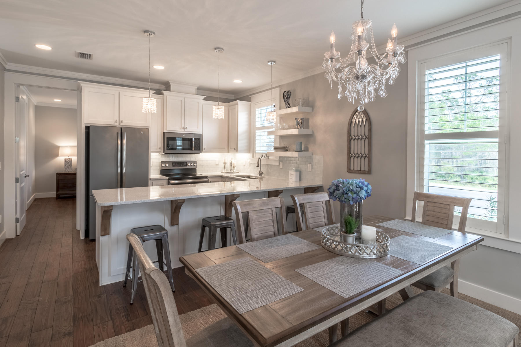 119 Michaela Lane Santa Rosa Beach, FL 32459 - Photo 2 of 28 a view of a dining room with furniture window and wooden floor