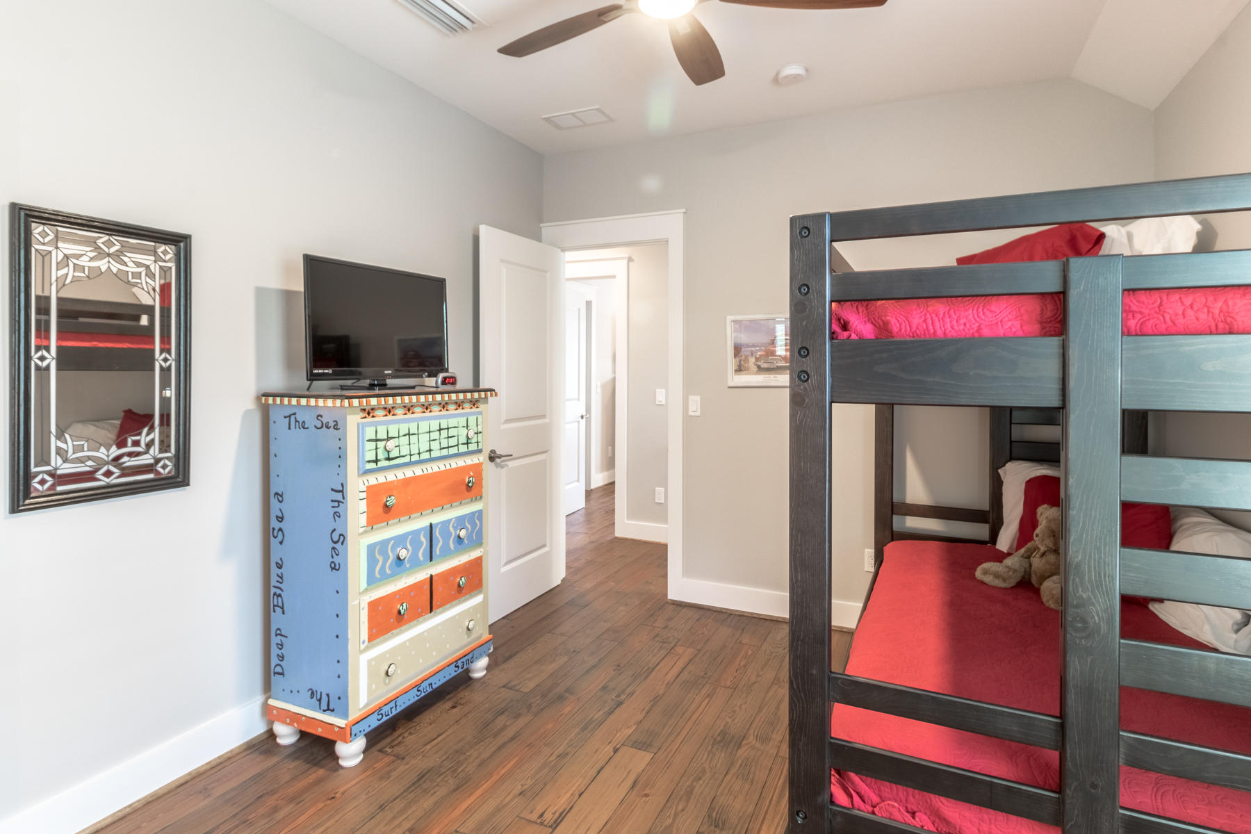 119 Michaela Lane Santa Rosa Beach, FL 32459 - Photo 21 of 28 a room with furniture and a flat screen tv