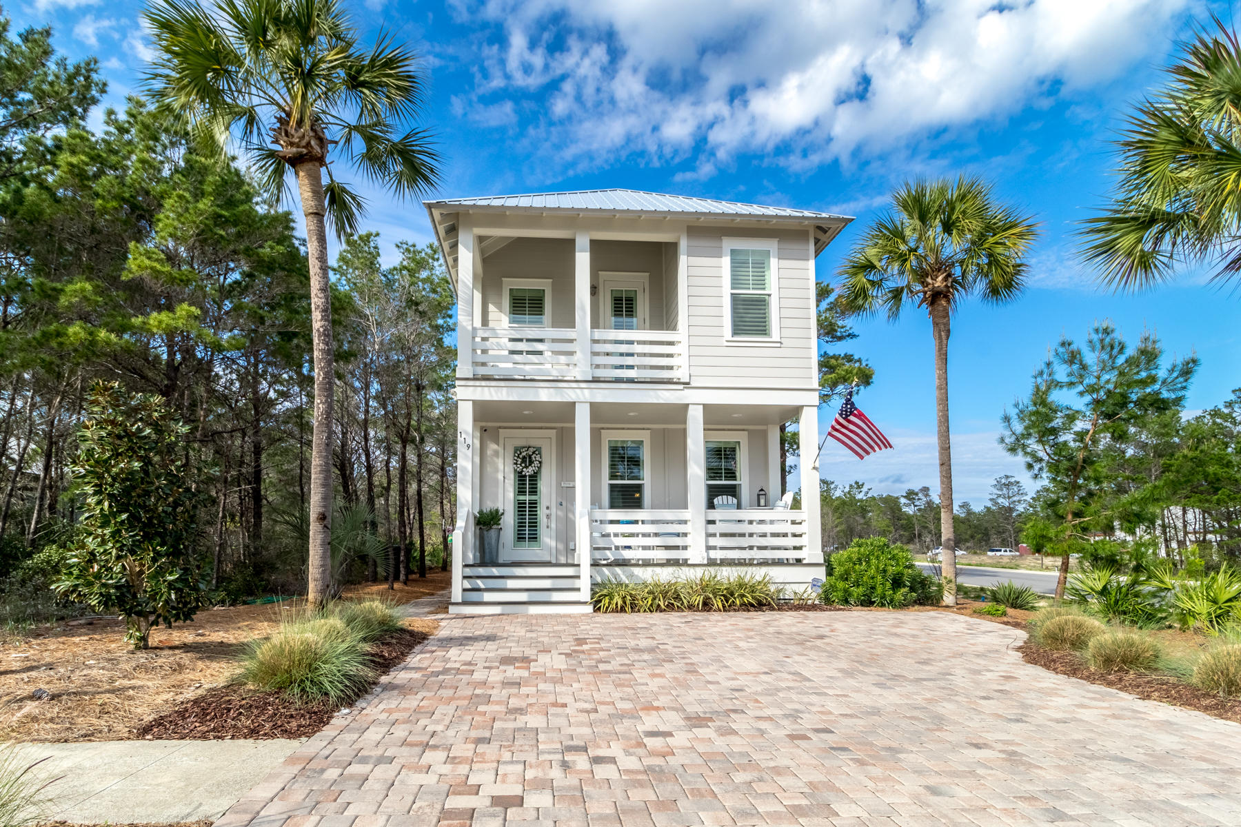 119 Michaela Lane Santa Rosa Beach, FL 32459 - Photo 25 of 28 a house with a tree in front of it