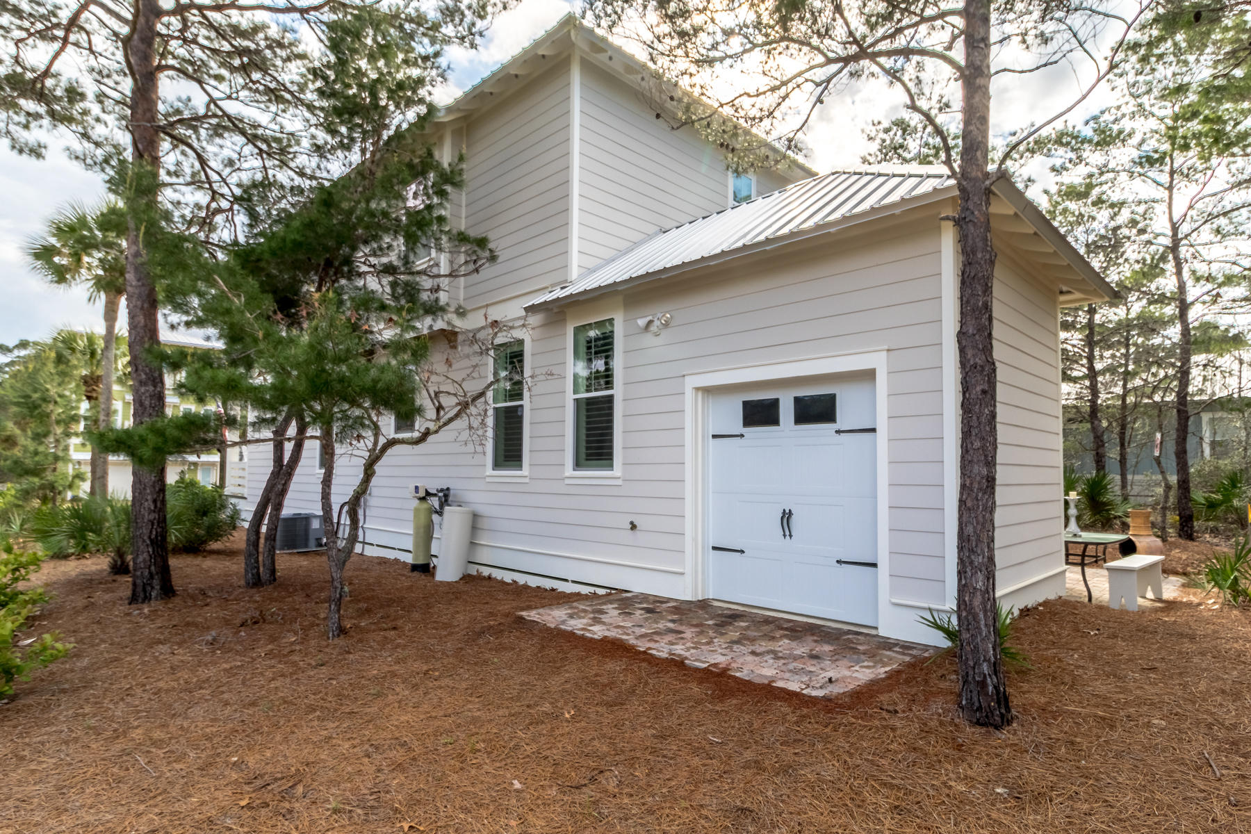 119 Michaela Lane Santa Rosa Beach, FL 32459 - Photo 26 of 28 a view of a house with a yard and garage