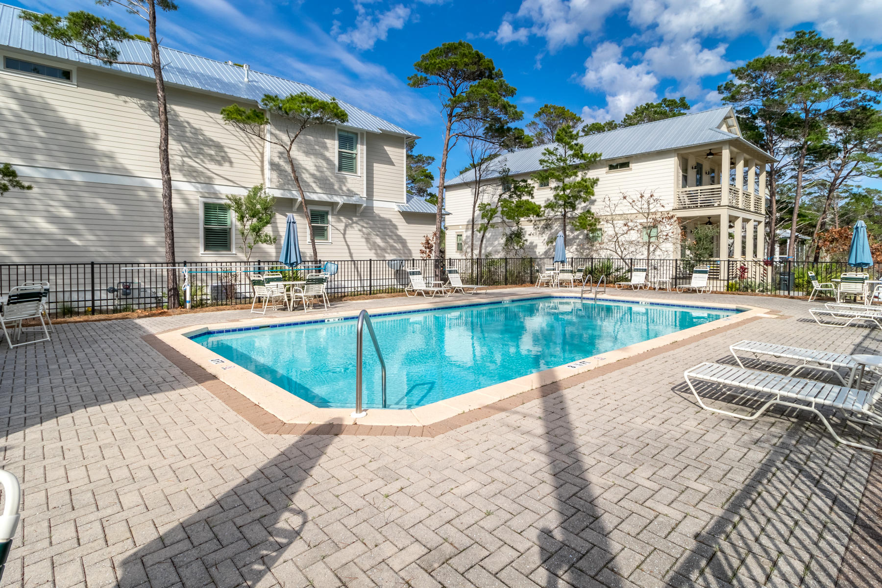 119 Michaela Lane Santa Rosa Beach, FL 32459 - Photo 27 of 28 a view of a swimming pool with a patio