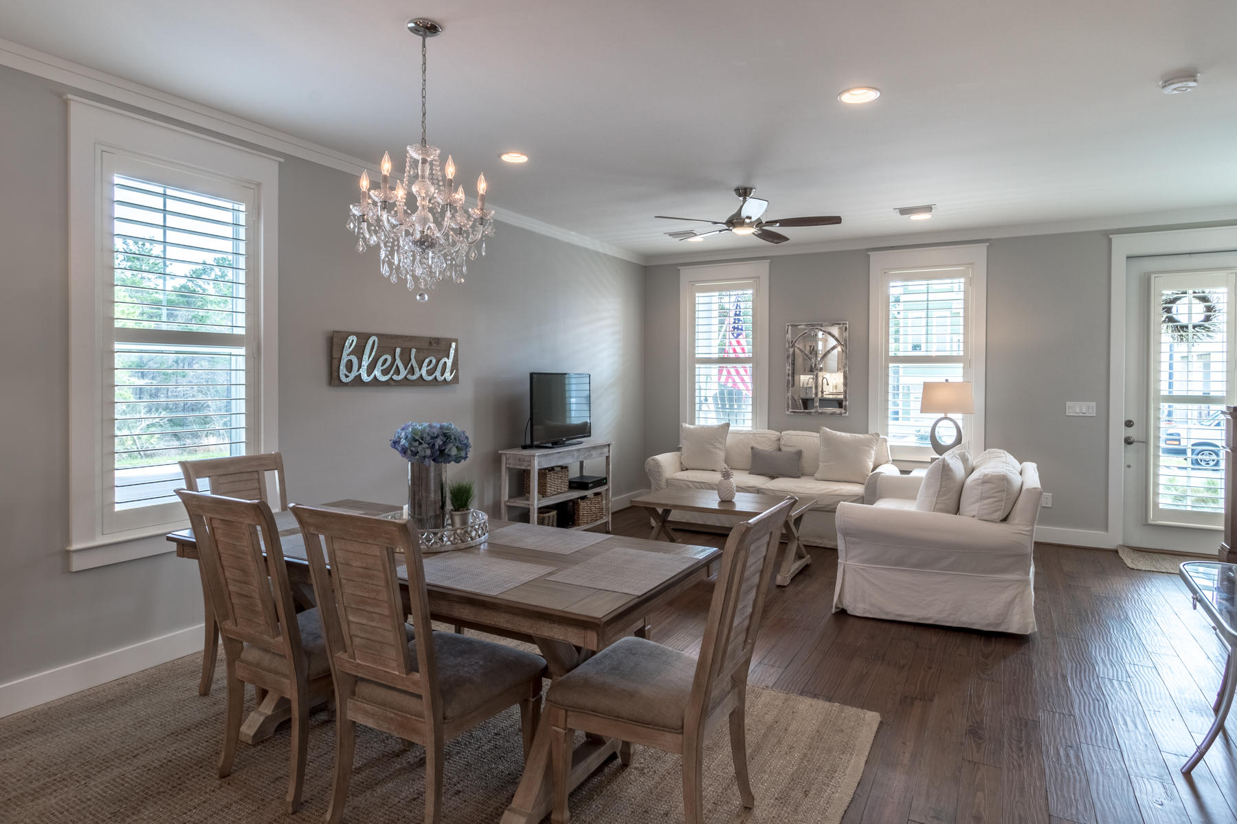 119 Michaela Lane Santa Rosa Beach, FL 32459 - Photo 4 of 28 a view of a dining room with furniture window and wooden floor