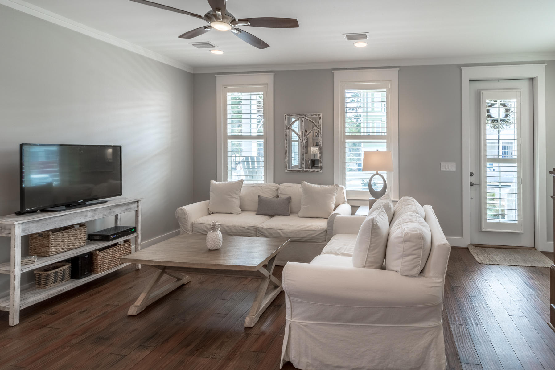 119 Michaela Lane Santa Rosa Beach, FL 32459 - Photo 5 of 28 a living room with furniture and a flat screen tv