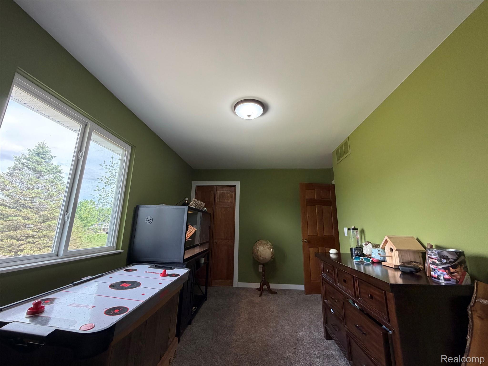 2712 North Branch Road North Branch, MI 48461 - Photo 27 of 37 Office space featuring dark colored carpet and baseboards