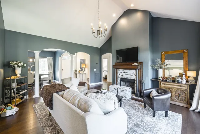 a kitchen with cabinets appliances and a sink