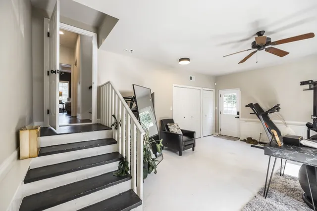 a view of a deck with table and chairs and wooden floor