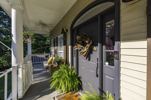 a view of a porch with seating space