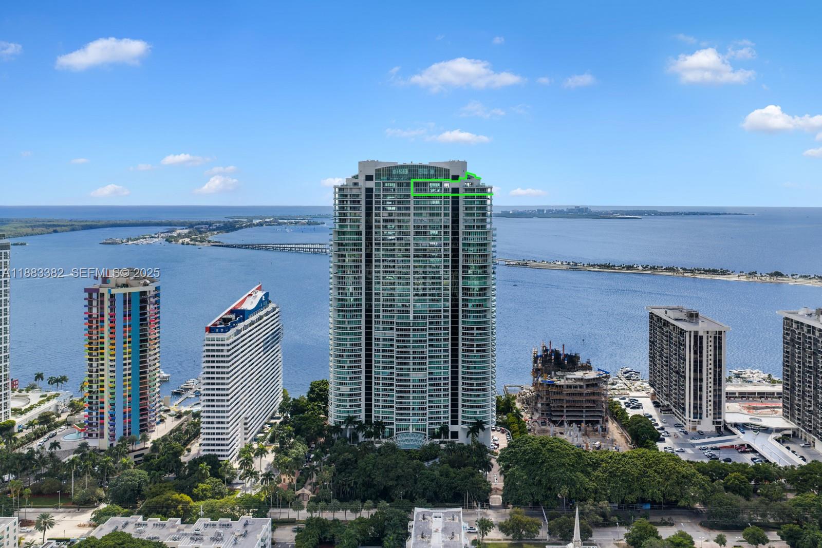 1643 Brickell Avenue, Unit PH4902 Miami, FL 33129 - Photo 38 of 38 a city view with tall buildings and a street