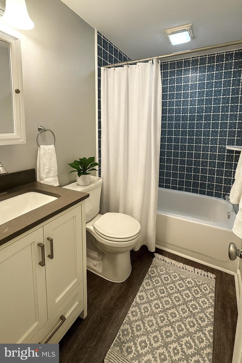 318 Carter Avenue Denton, MD 21629 - Photo 14 of 38 Guest bath virtually staged for conceptual purpose