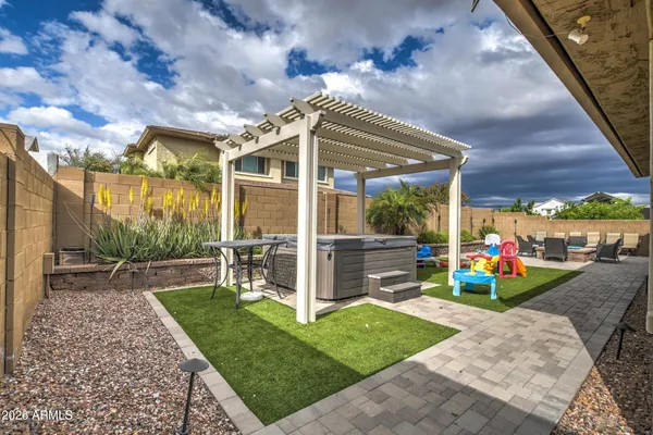 a view of yard with patio