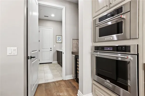 a kitchen with a sink stove and microwave