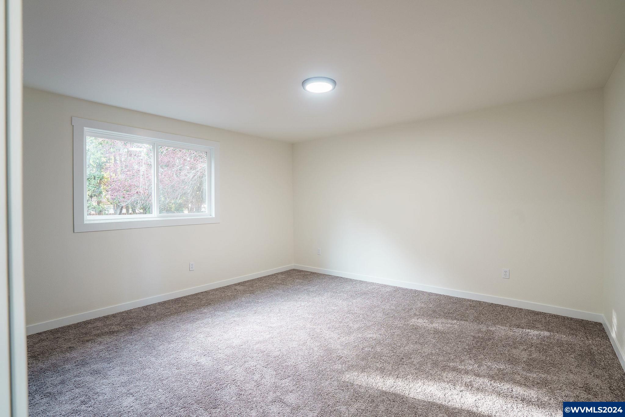 5085 Windsor Island Road North Keizer, OR 97303 - Photo 17 of 22 an empty room with windows