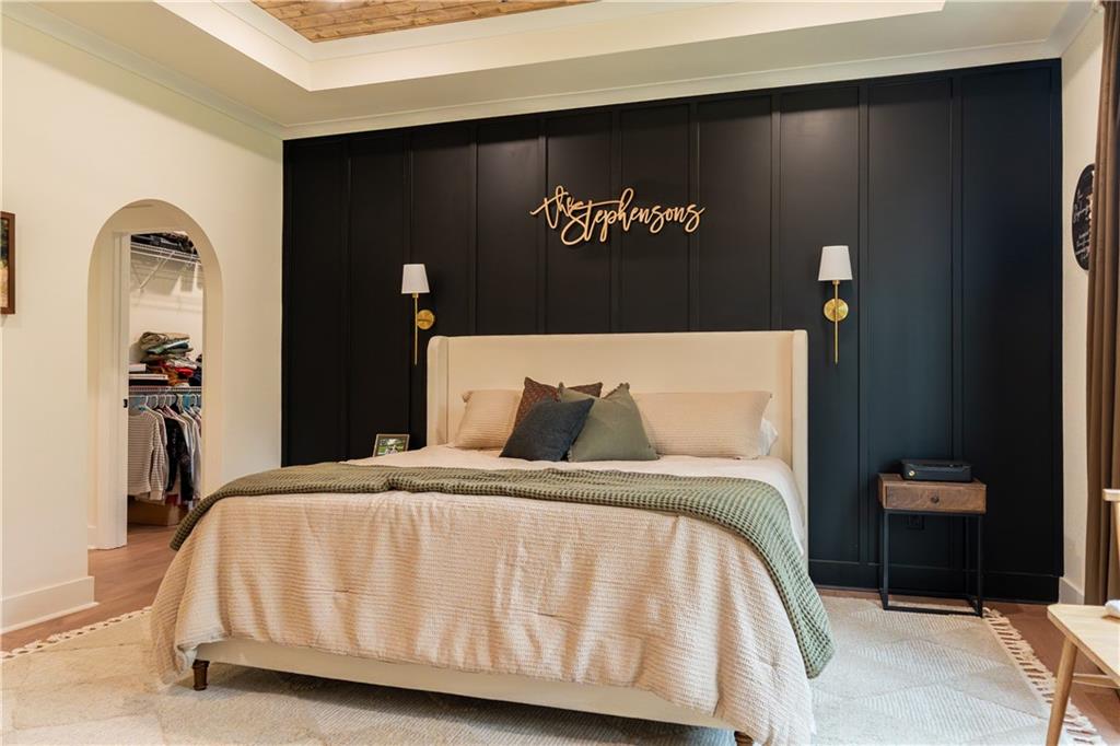 526 Brice Station Road Silver Creek, GA 30173 - Photo 12 of 32 a bedroom with a bed and mirror