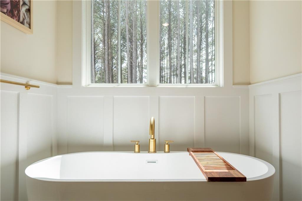 526 Brice Station Road Silver Creek, GA 30173 - Photo 16 of 32 a bathroom with a sink and a window